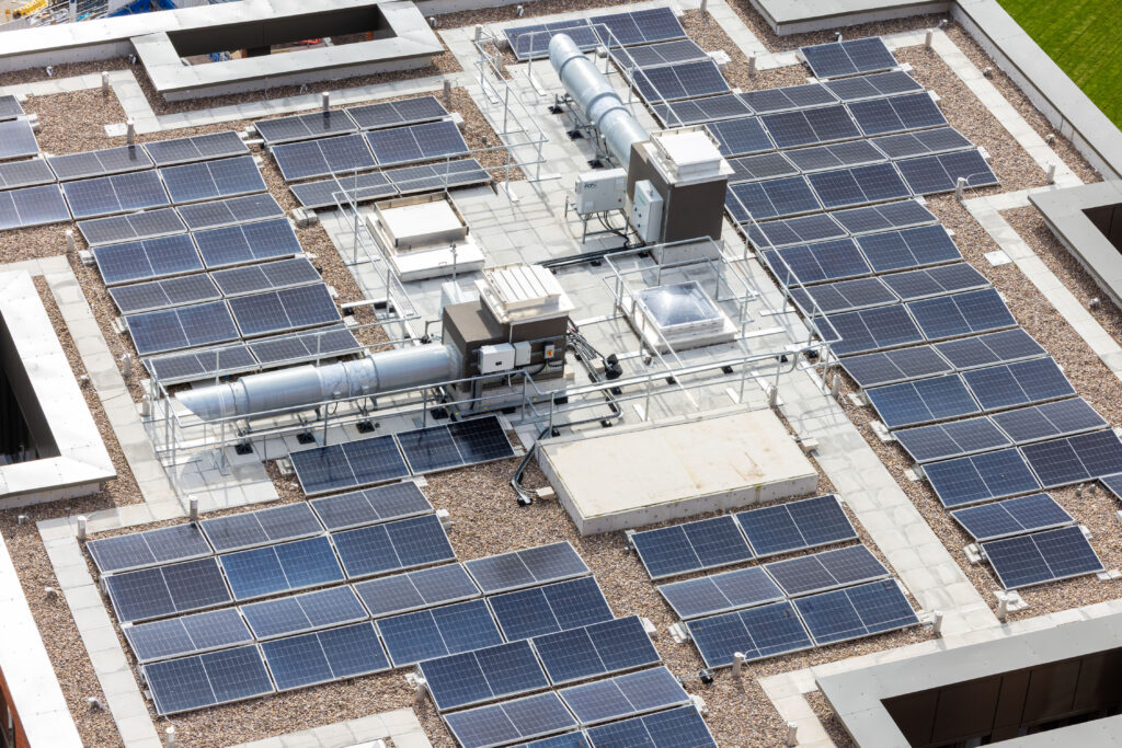 Solar PV installation on the roof at Lumina Village, supporting renewable energy and low-carbon building services delivery